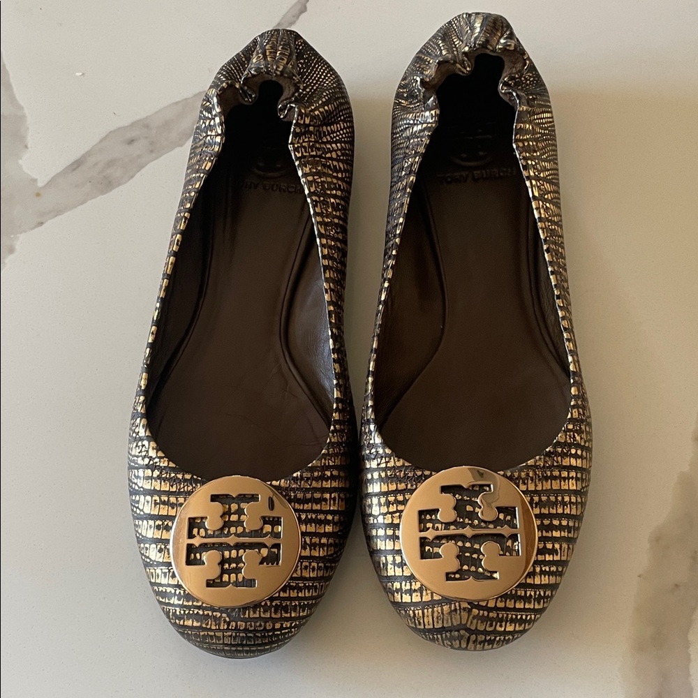 Tory Burch Women's Gold and Black Ballet Flats “Minnie Travel Ballet Flats.”